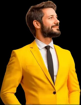 Homem meia idade com terno amarelo, gravata preta, barba cerrada, cabelo castanho escuro penteado para o lado, barba castanha escura no rosto todo